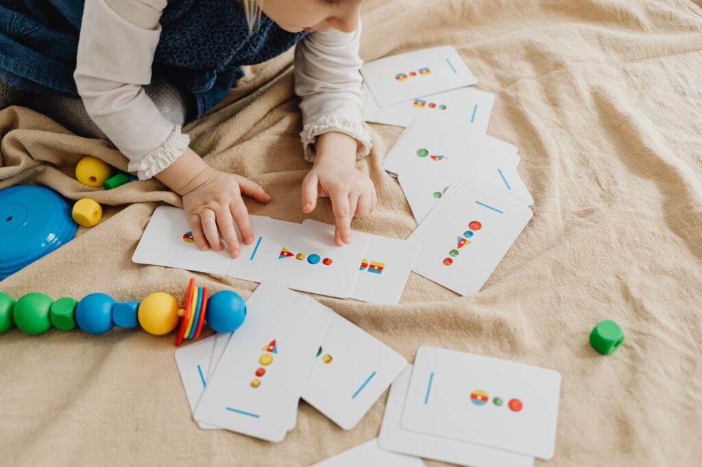 Organized shelf showcasing a variety of educational toys for hands-on learning and creativity.